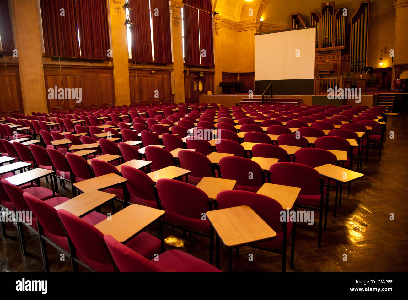 rows of empty seats in a lecture theatre at Bangor University Wales UK Stock Photo