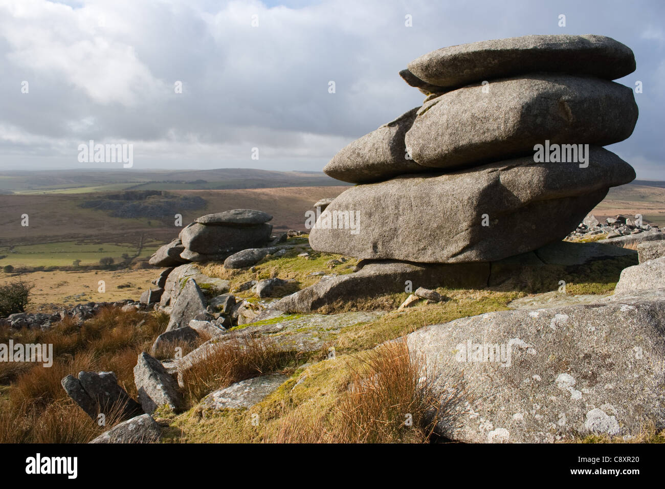 The Cheesewring is a granite tor in Cornwall, situated on the eastern flank of Bodmin Moor on Stowes Hill Stock Photo