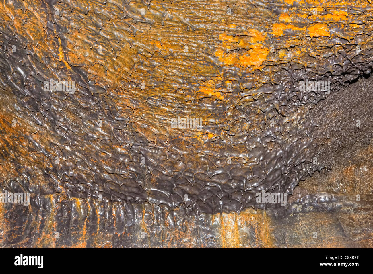 Lava formations in the Gruta do Carvao, lava tube Ponta Delgada, Sao ...