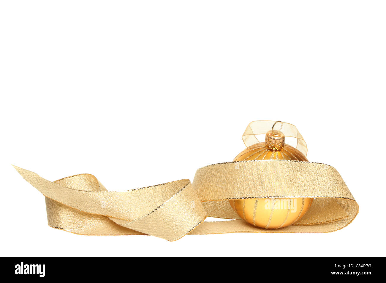 Gold Christmas bauble and ribbon isolated against white Stock Photo