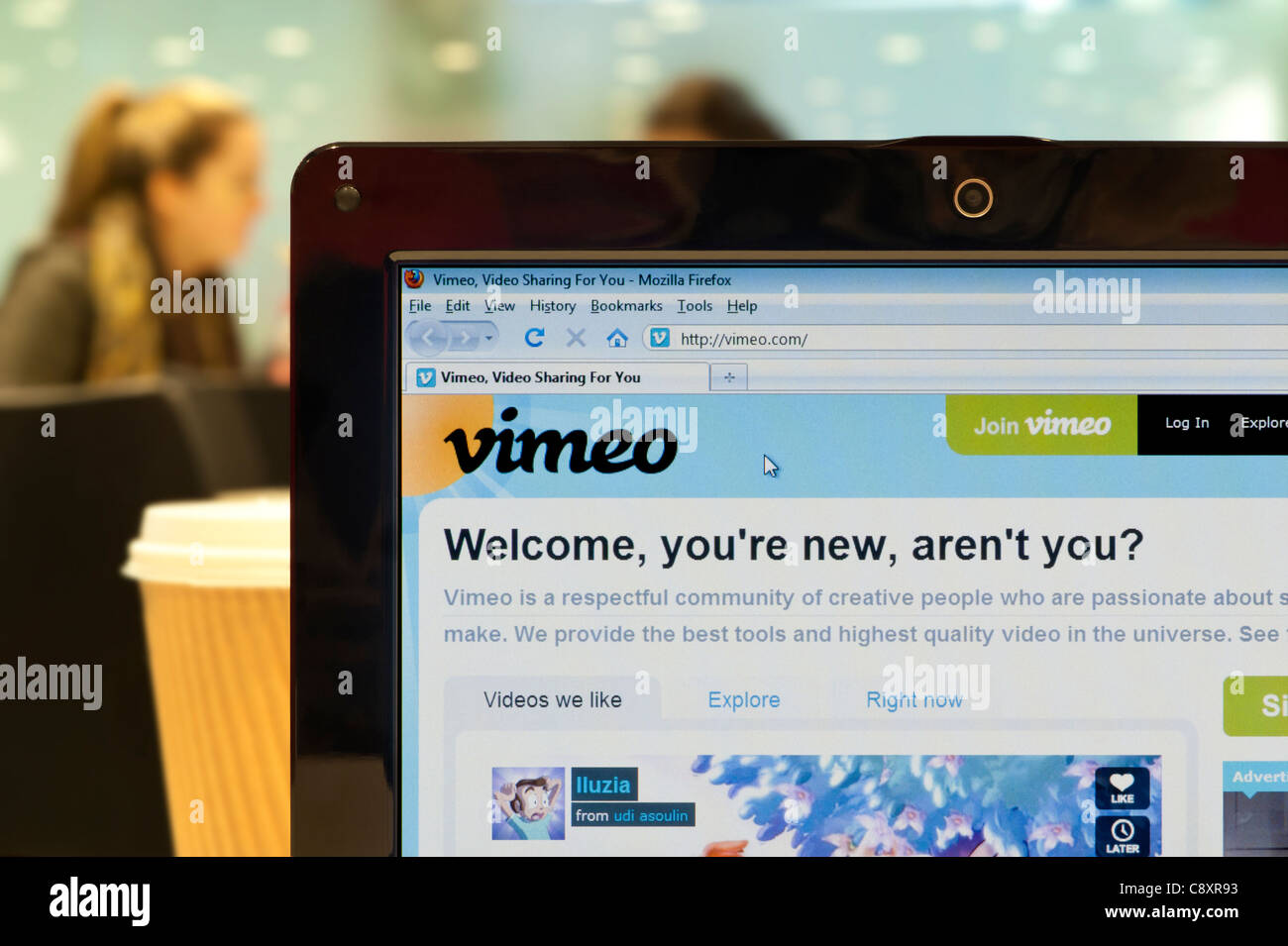 The Vimeo website shot in a coffee shop environment (Editorial use only: print, TV, e-book and editorial website). Stock Photo