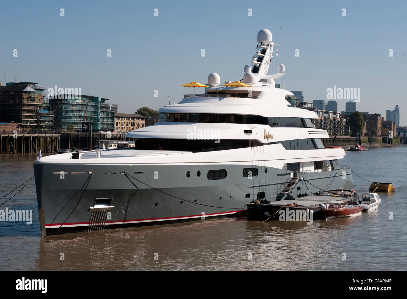 Luxury yacht owned by billionaire Joe Lewis docked in the Thames near Tower Bridge London Stock Photo