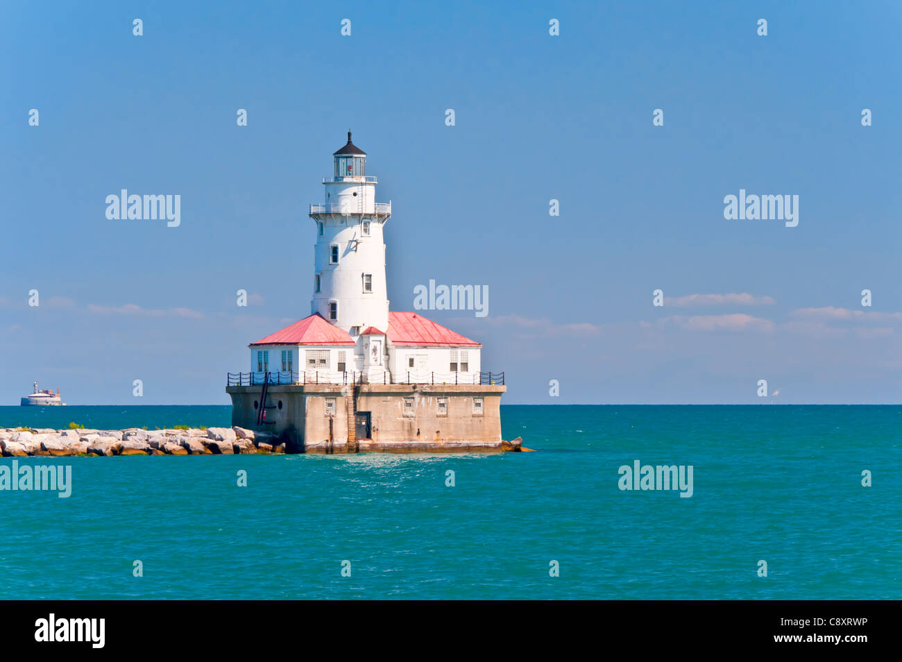 Chicago Harbor Lighthouse with the Four Mile Crib in the distance. Stock Photo