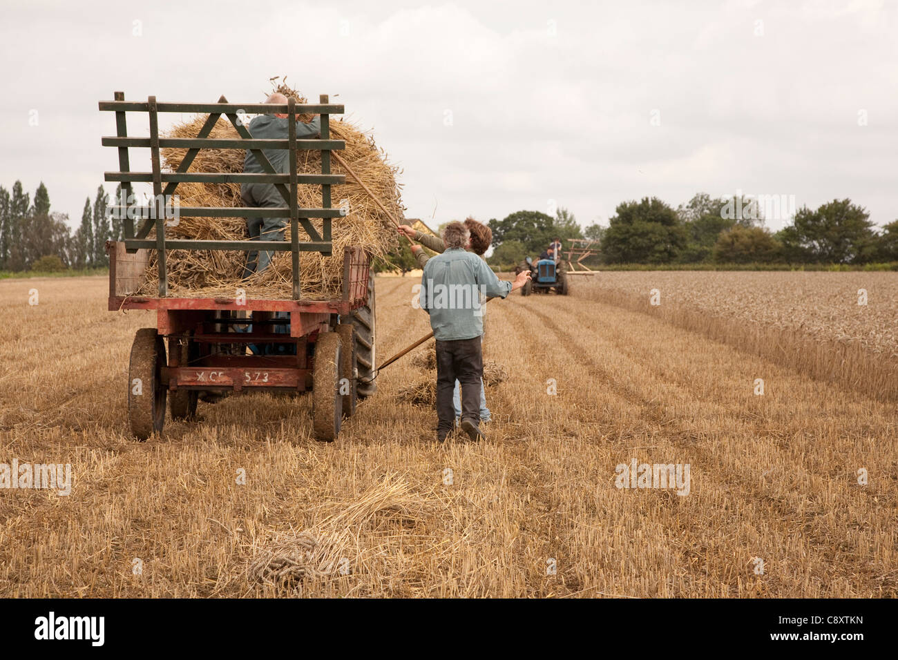 Antique farming methods being demonstrated. Stock Photo