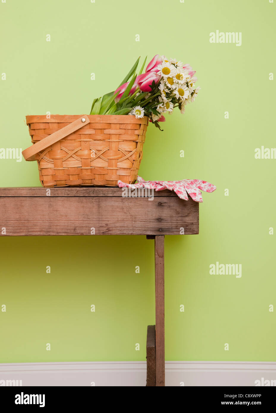USA, Illinois, Metamora, Wildflowers in basket on table Stock Photo