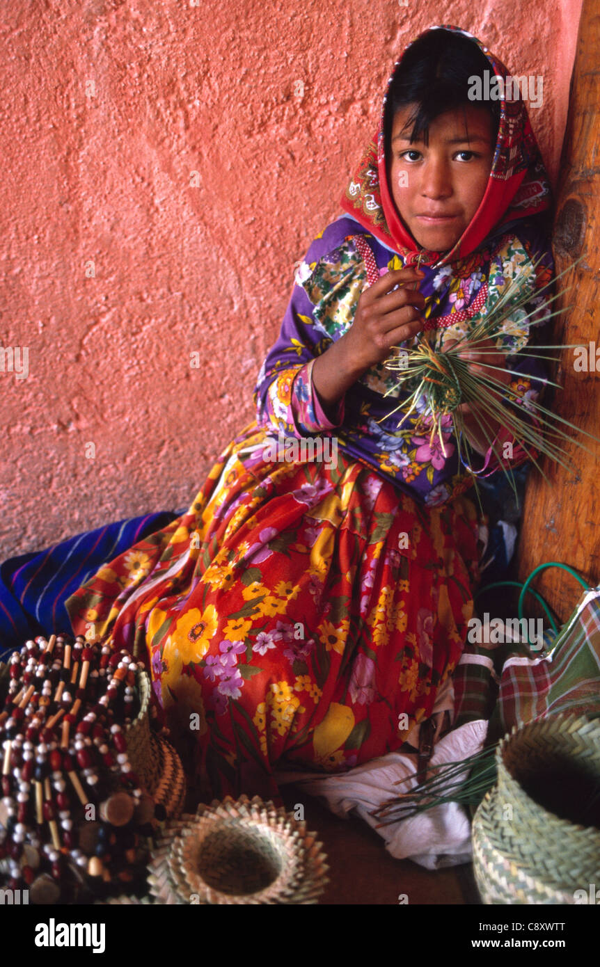Tarahumara girl making baskets at El Divisadero, Copper Canyon, Chihuahua, Mexico Stock Photo