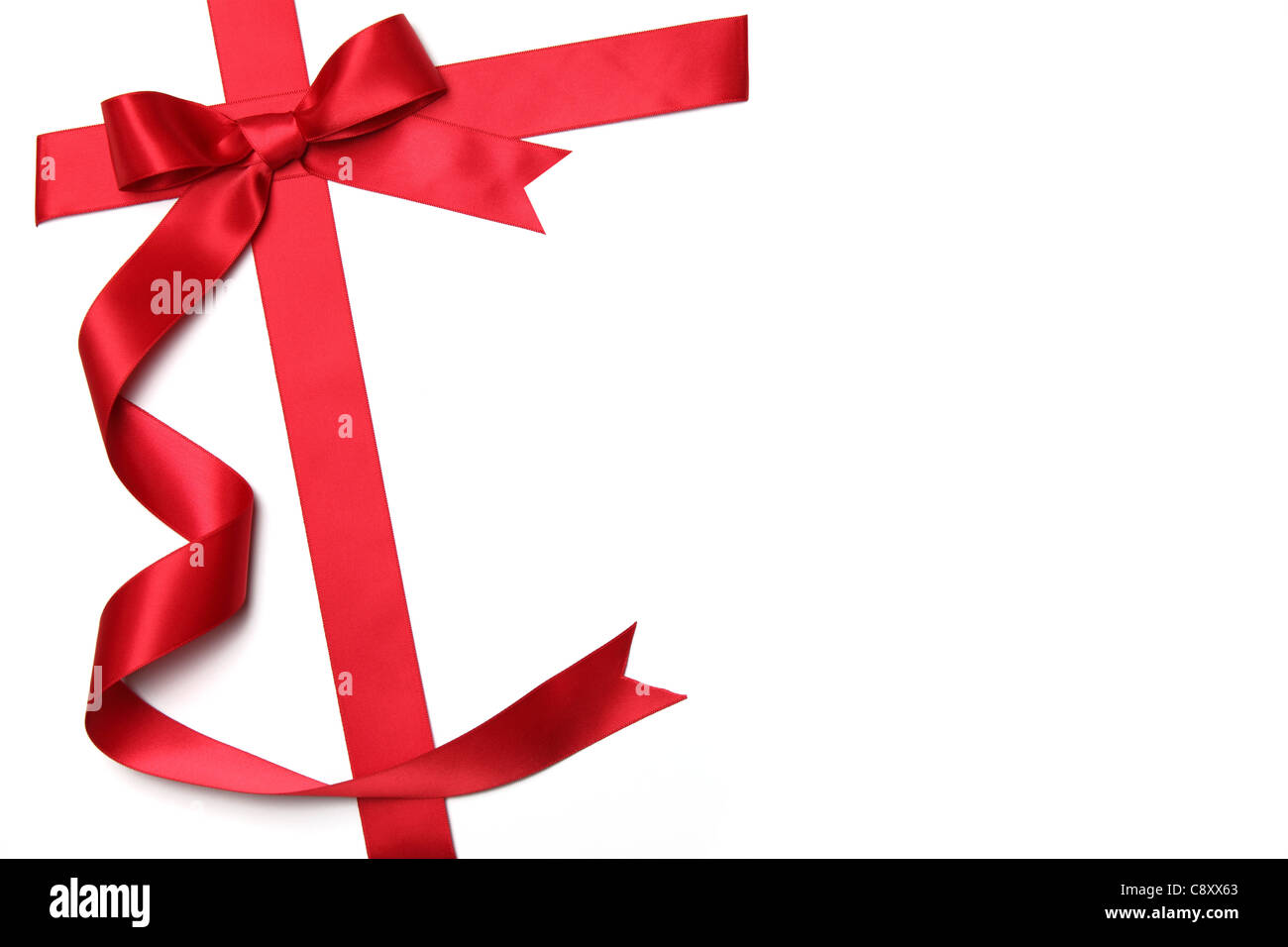 Red ribbon with bow isolated on white Stock Photo - Alamy