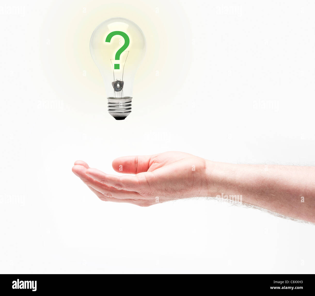 Studio shot of hand holding light bulb with question mark inside Stock  Photo - Alamy, image size:1300x1220