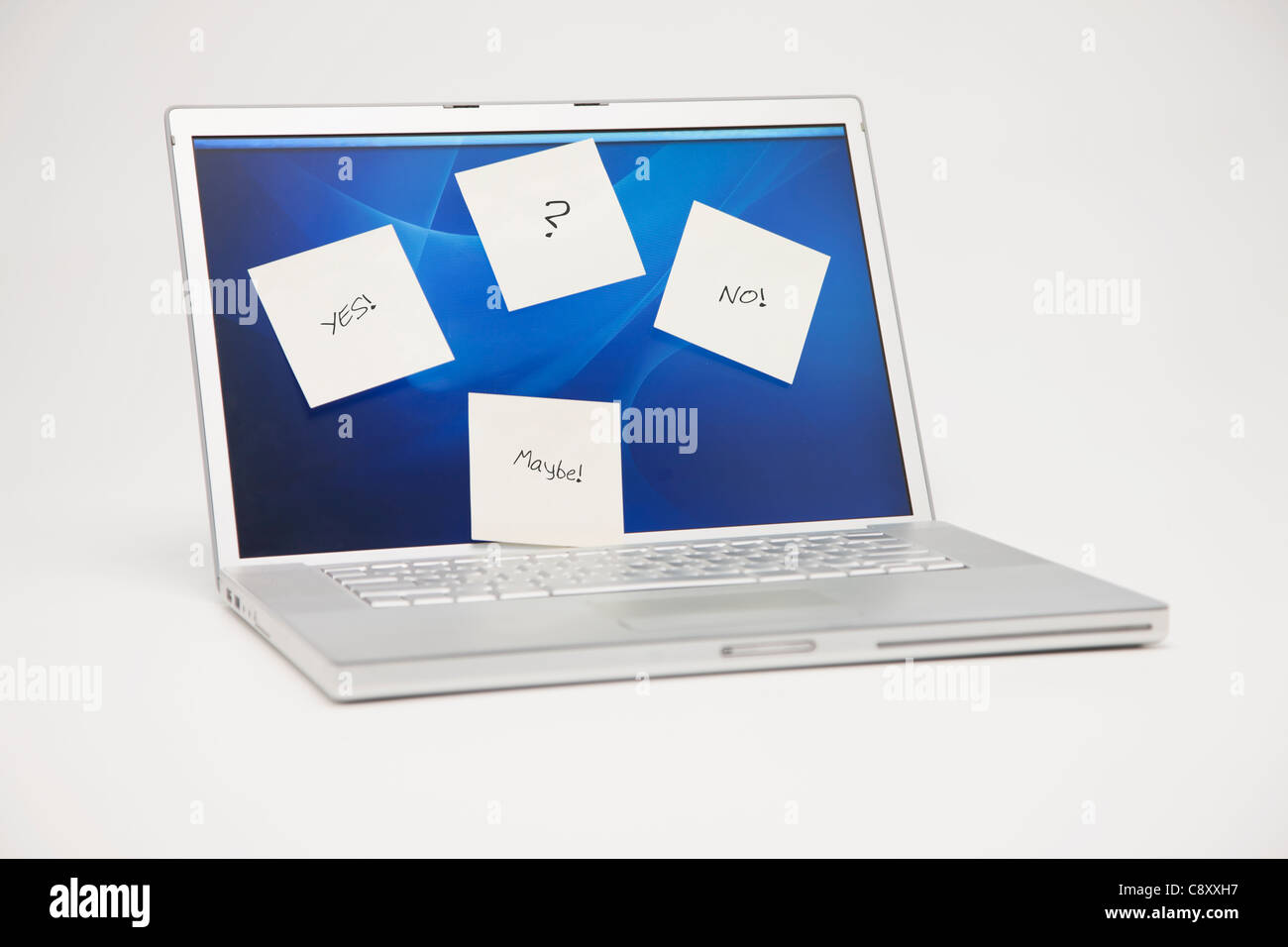 Studio shot of laptop with adhesive notes on screen Stock Photo