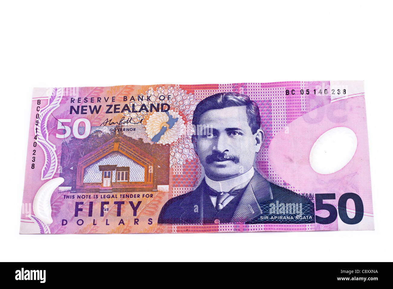 Dollar note in New Zealand currency, isolated over white background. Stock Photo
