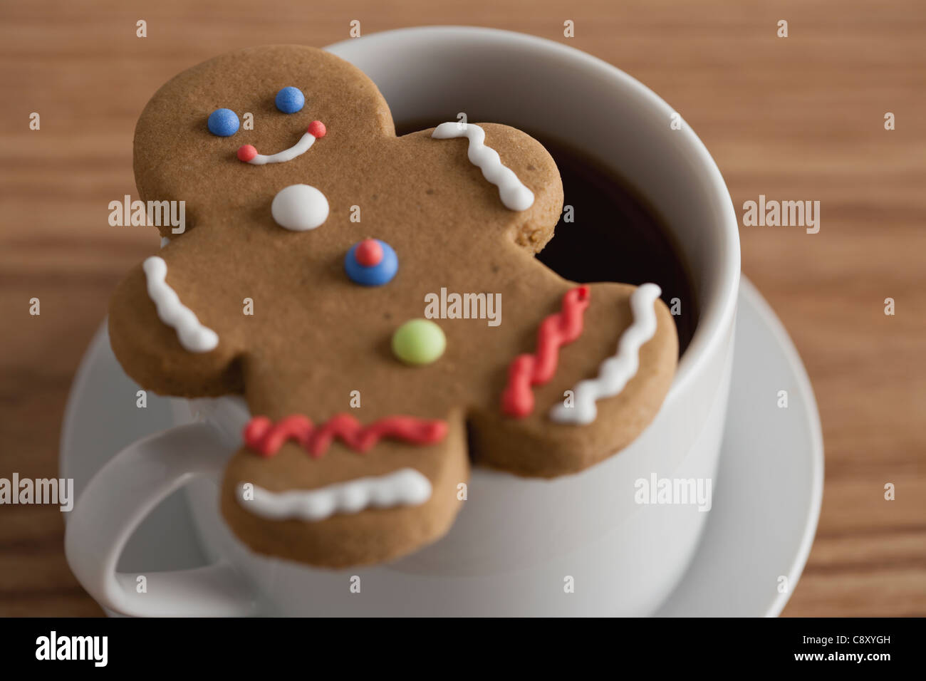 USA, Illinois, Metamora, Close up of  coffee cup and gingerbread man Stock Photo