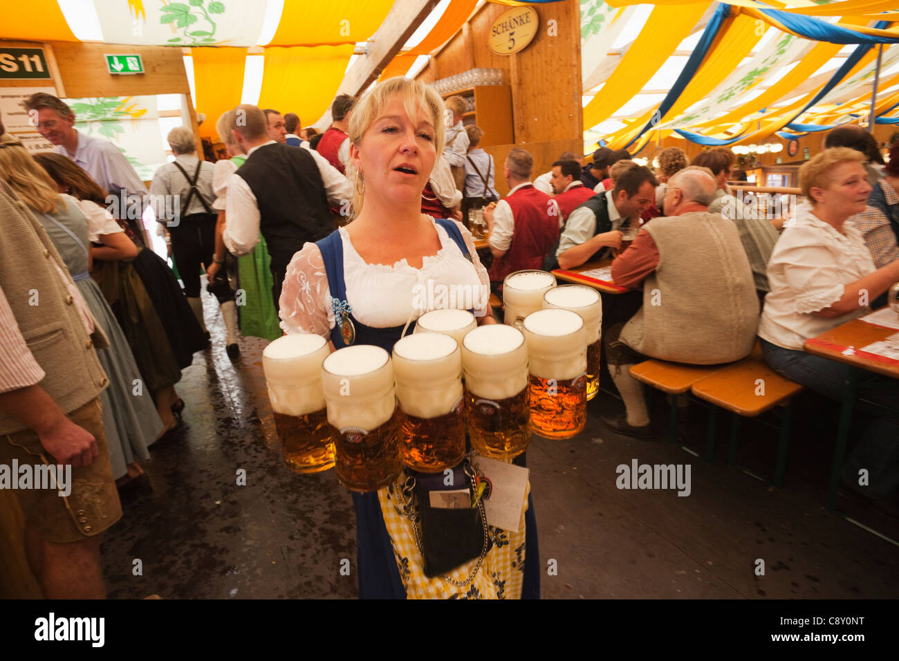 Germany, Bavaria, Munich, Oktoberfest, Waitress Holding Beer Steins Stock Photo Alamy