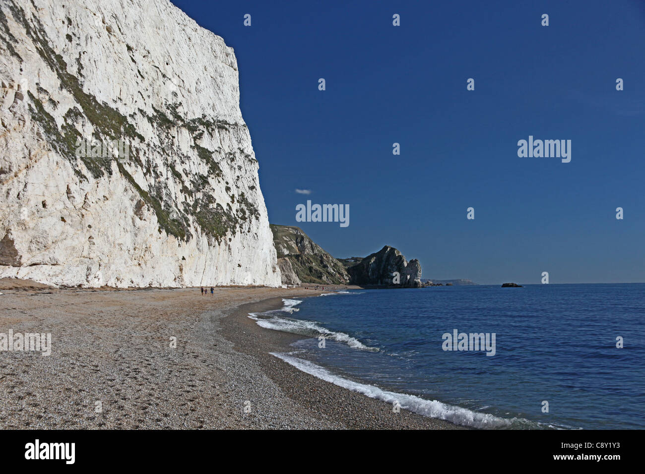 Looking east towards Durdle Door from underneath the chalk cliffs of Swyre Head on the World Heritage Coast in Dorset England UK Stock Photo