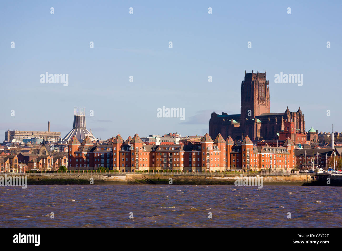 Waterfront Apartment buildings with Catholic and Anglican Cathedrals, Liverpool, Merseyside, England Stock Photo
