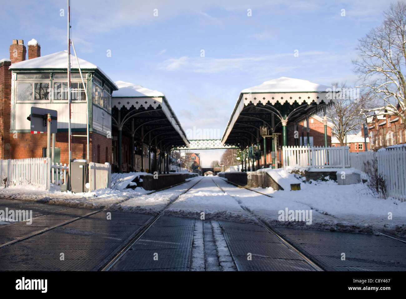 Snow comes to Hale train station in Greater Manchester, England Stock