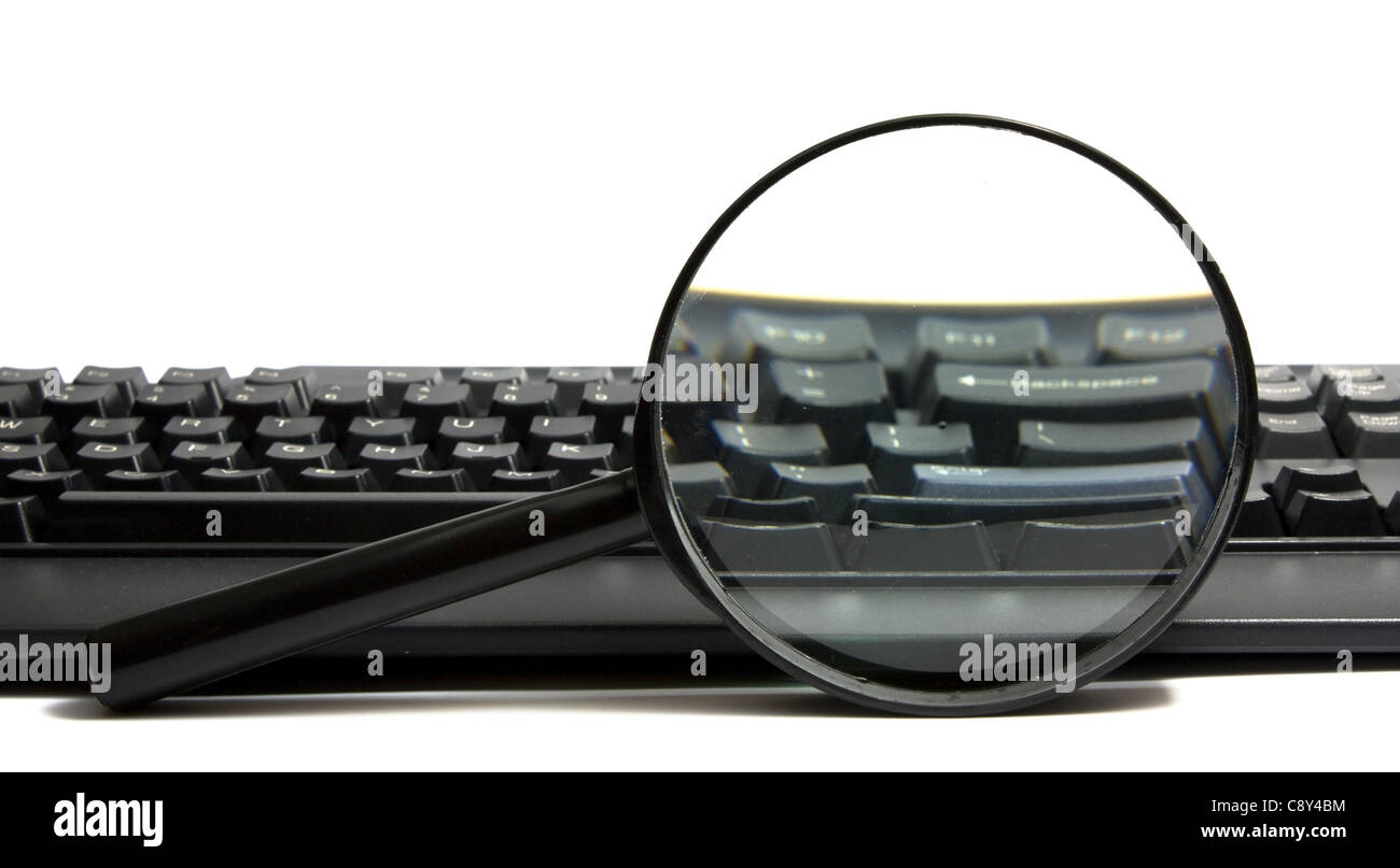 keyboard with a magnifying glass Stock Photo Alamy