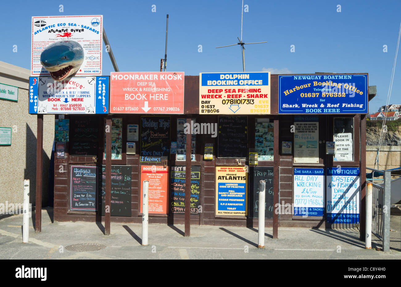 Newquay harbour fishing trips and sea excursions booking office kiosks, Cornwall UK. Stock Photo