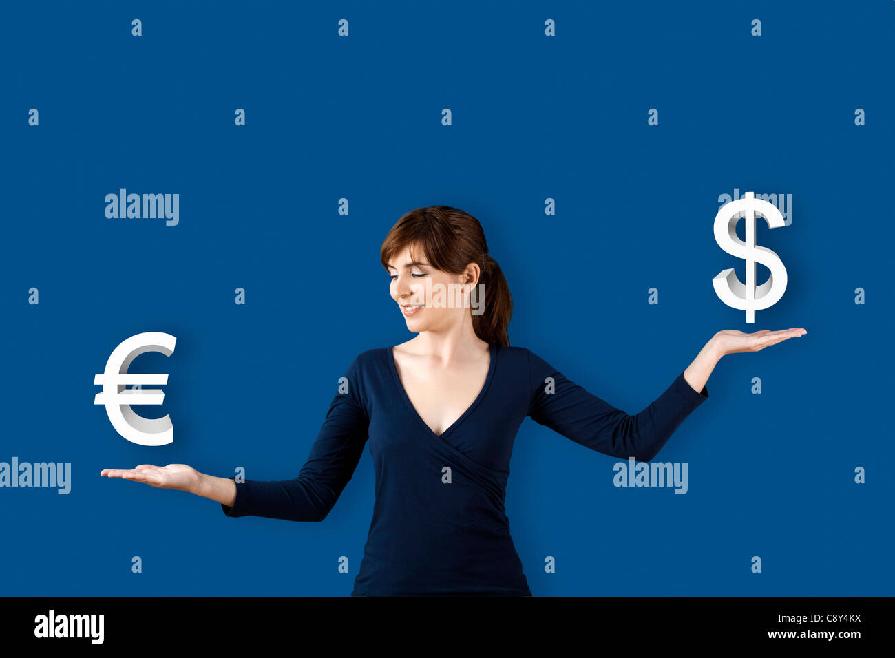 Woman making a scale with her arms and checking Euro versus Dolar Stock Photo