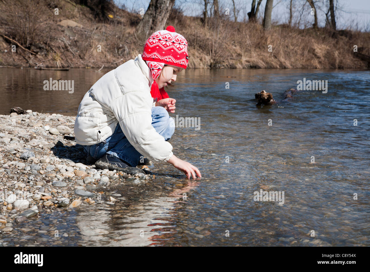 little girl by river Stock Photo - Alamy