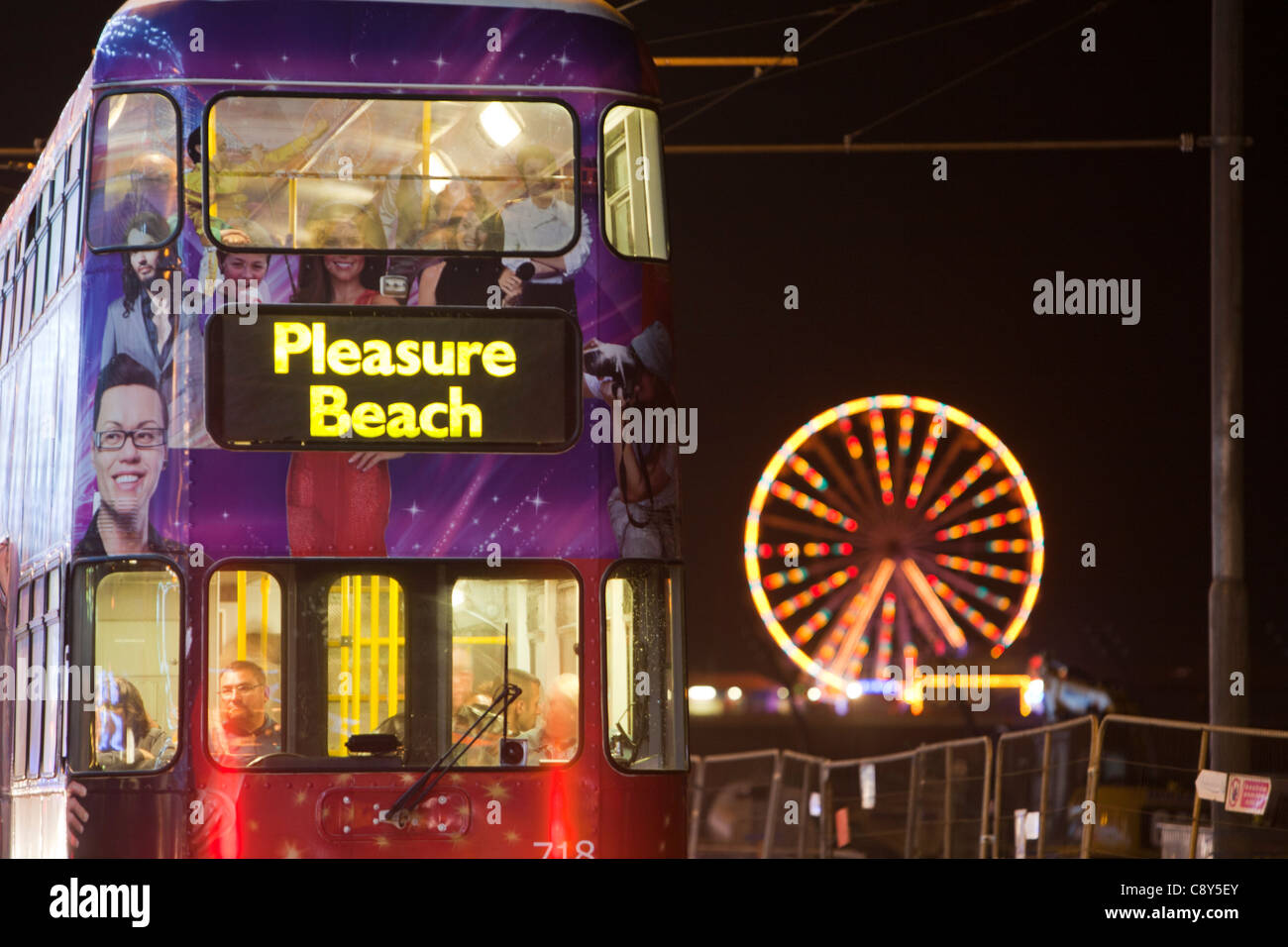 A bus on the promenade during the annual, Blackpool Illuminations, Blackpool, Lancashire, UK. Stock Photo
