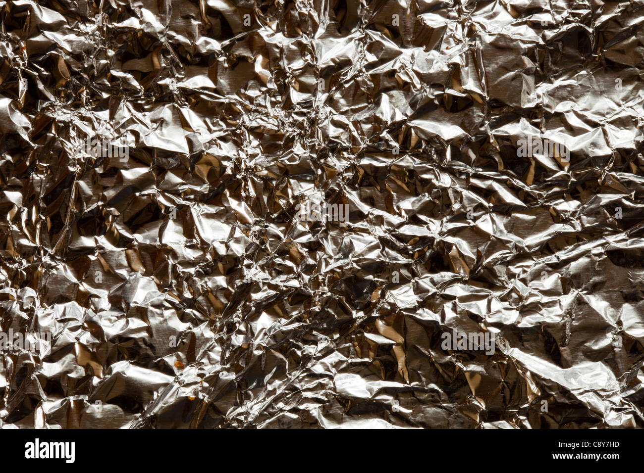 Crumpled tin foil Stock Photo - Alamy