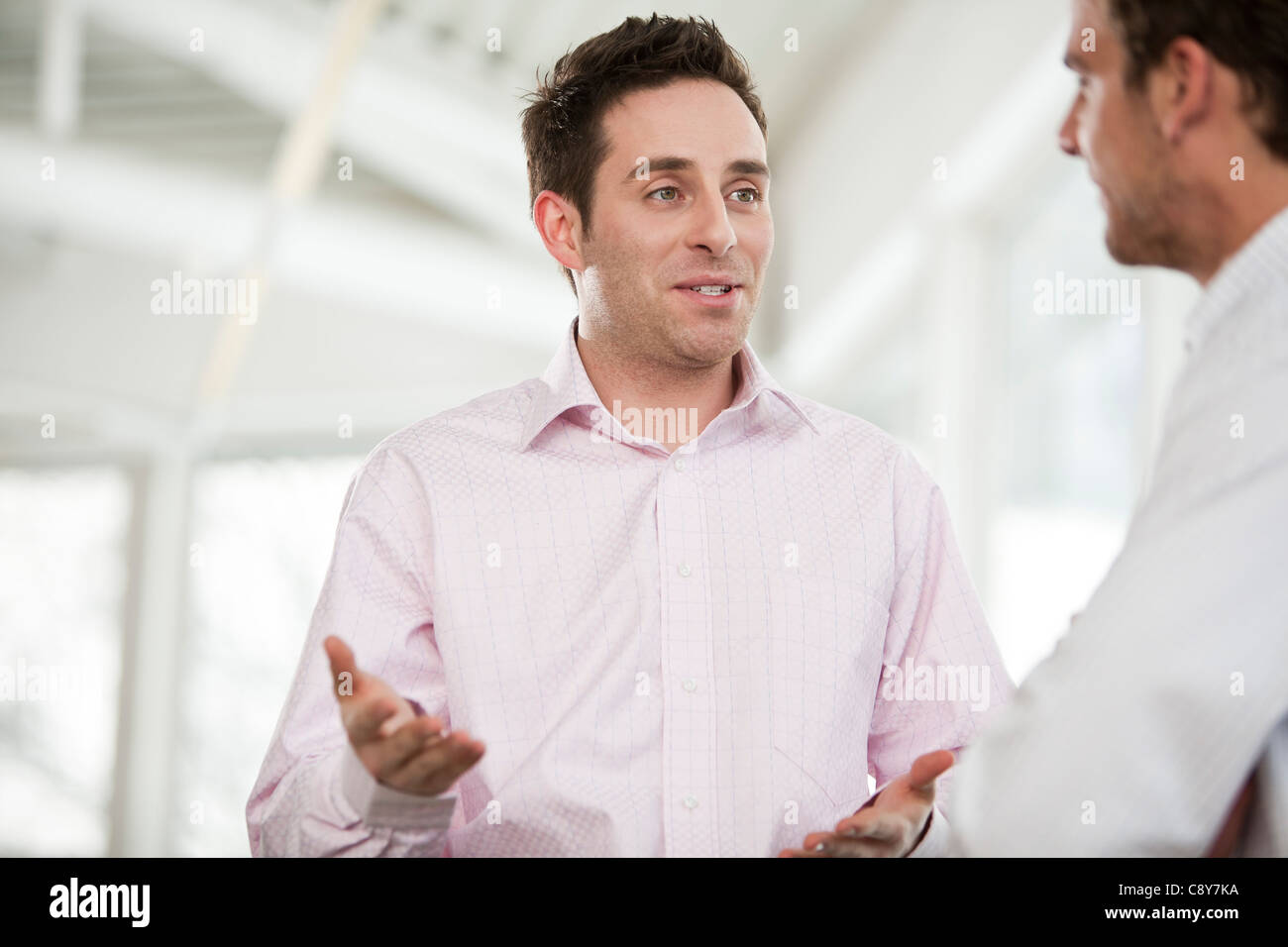 two businessmen having discussion Stock Photo