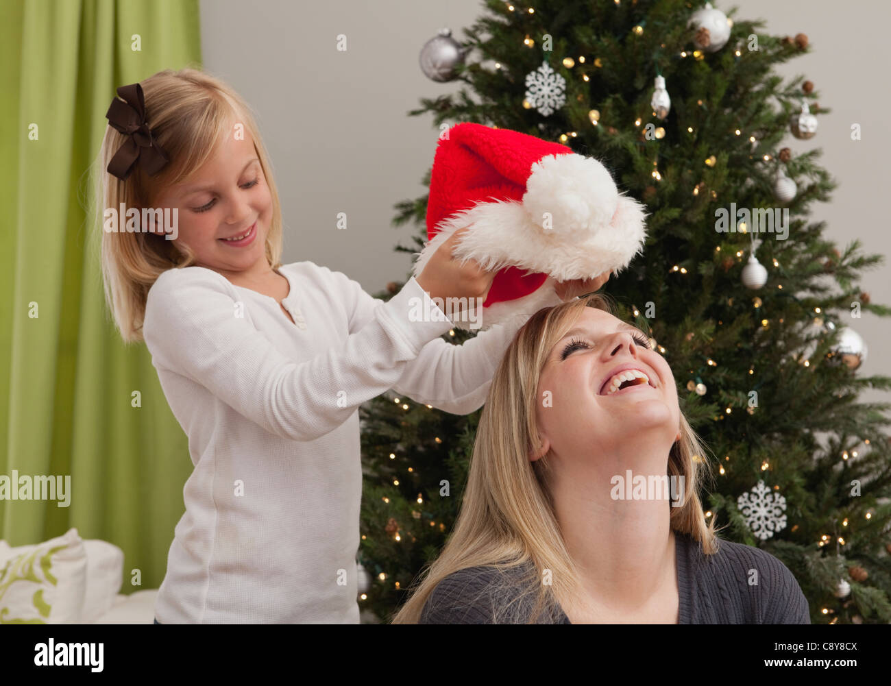 Putting a santa hat on a photo Clearance