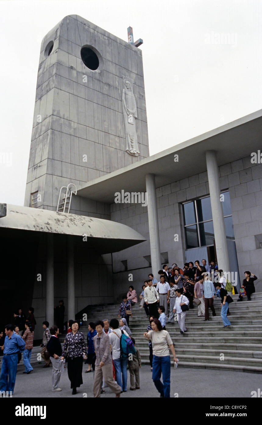 Coming out of Sunday catholic mass, Jeoldusan Martyrs memorial and museum, Seoul, Korea Stock Photo