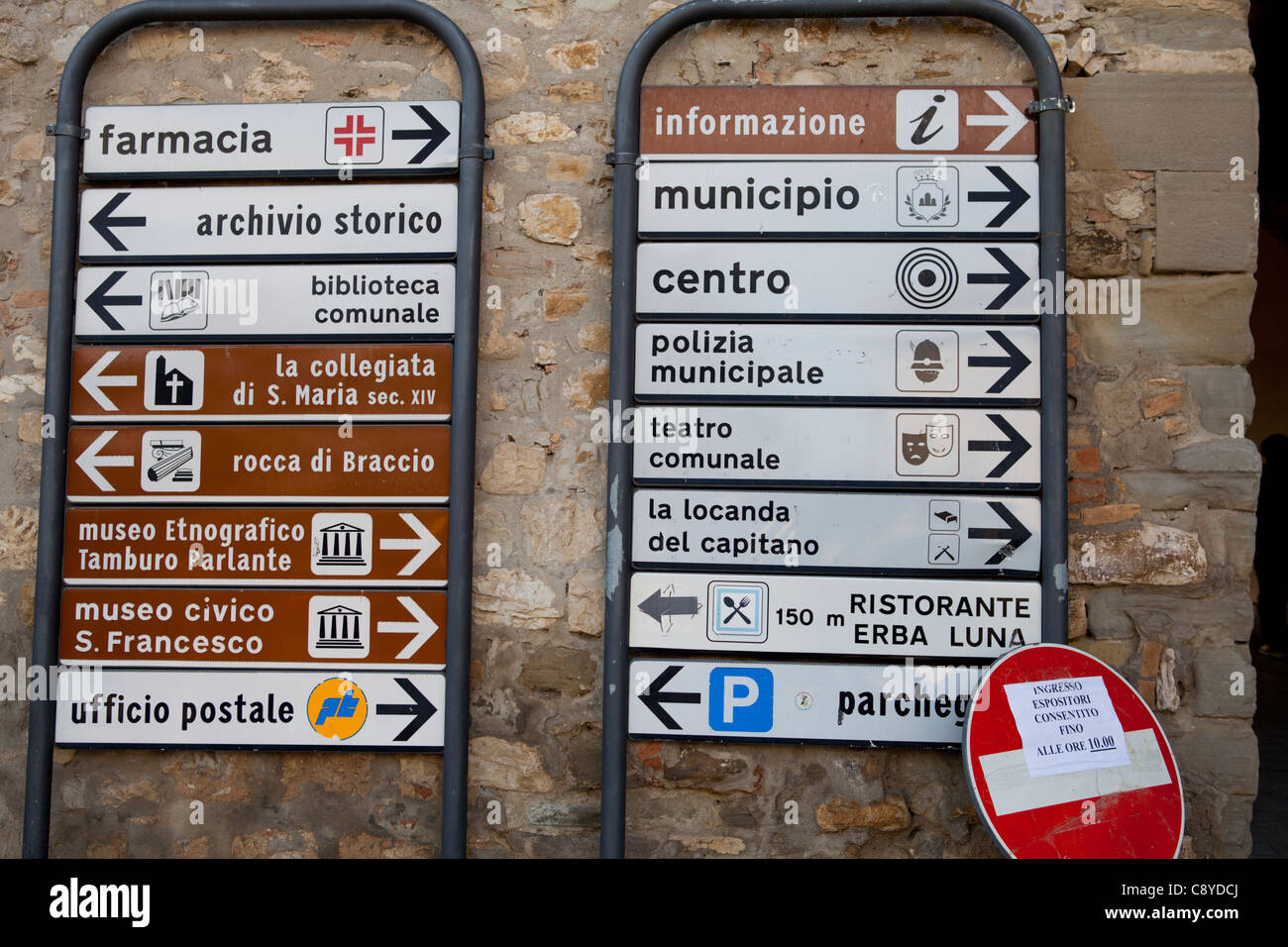 Street signs indicating major attraction in the small village of Montone, Umbria, Italy Stock Photo