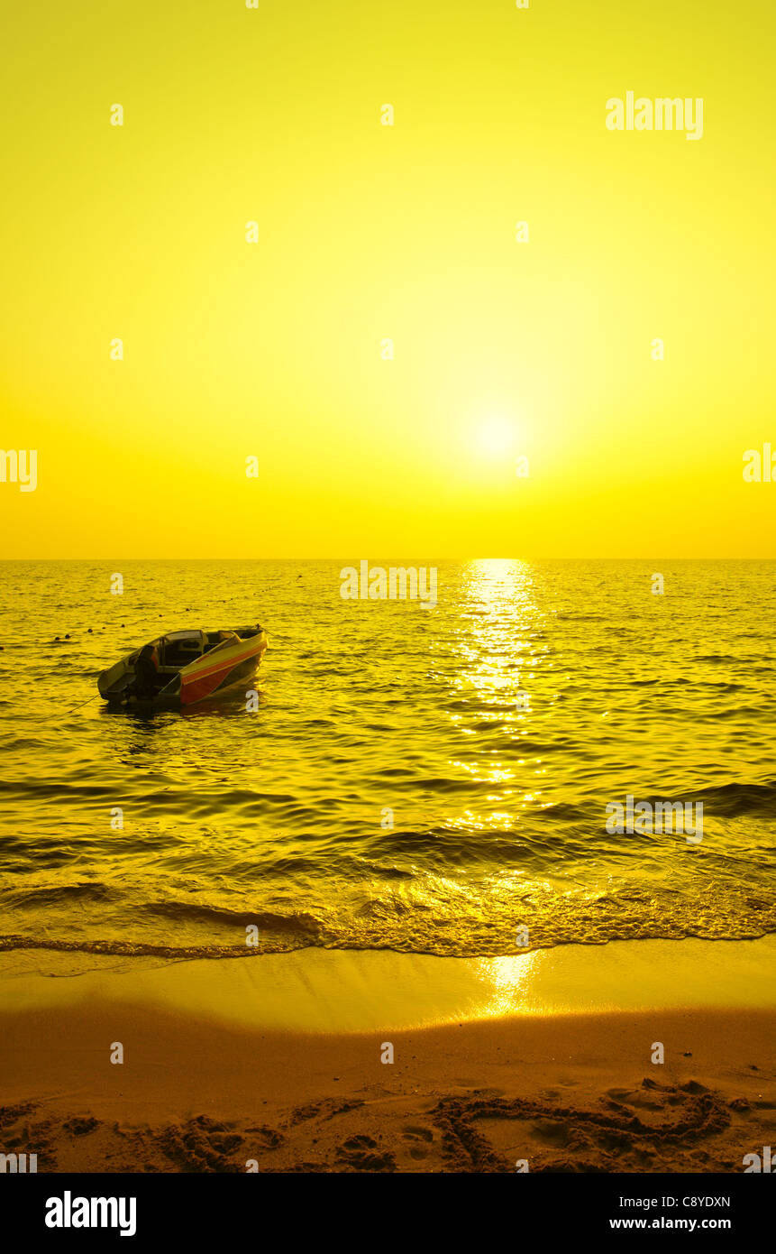 Motor boat and sea at sundown Stock Photo - Alamy
