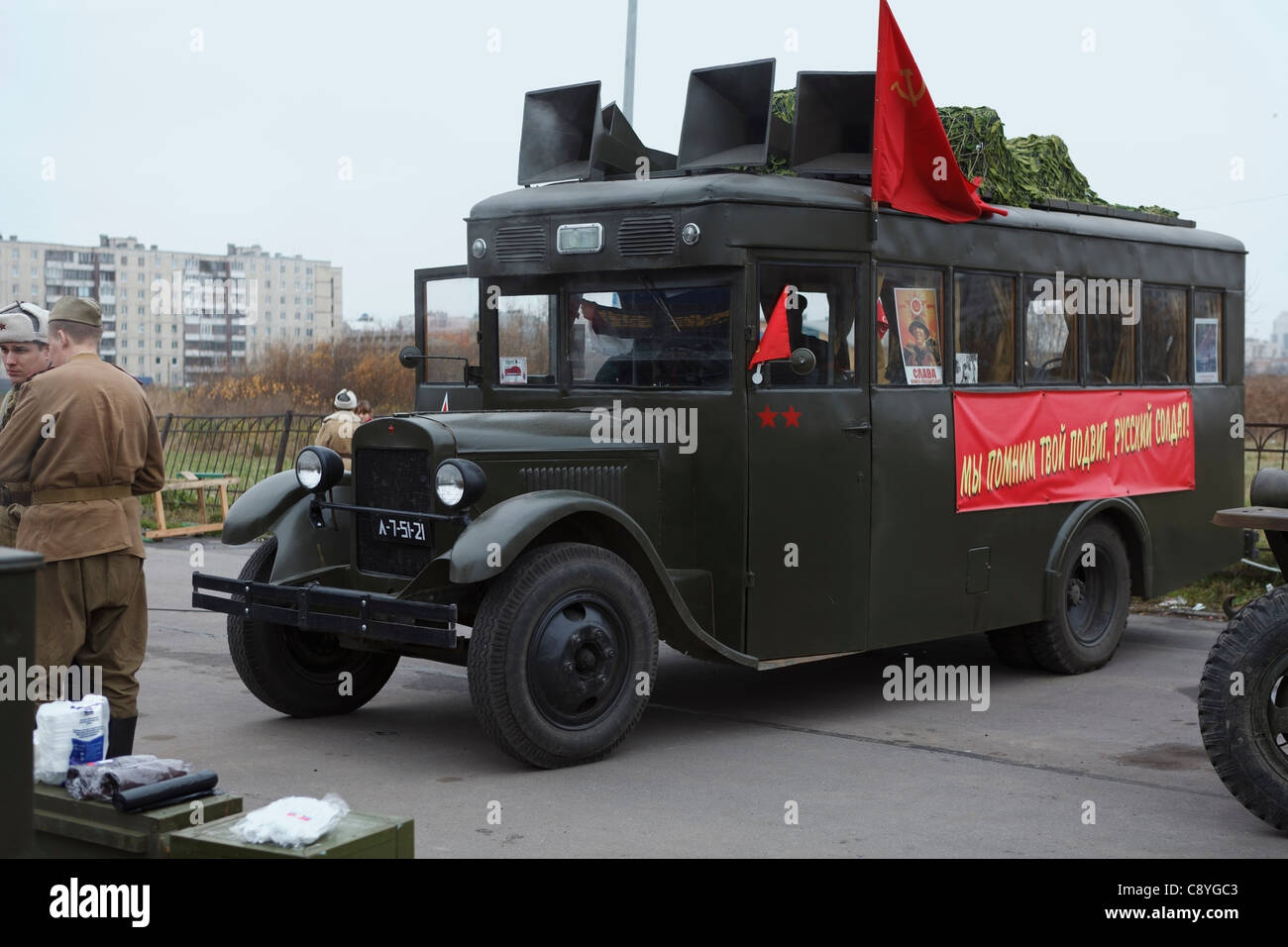 Soviet bus GAS-03-30 with red flags on November 4, 2011 in Saint-Petersburg, Russia. Stock Photo