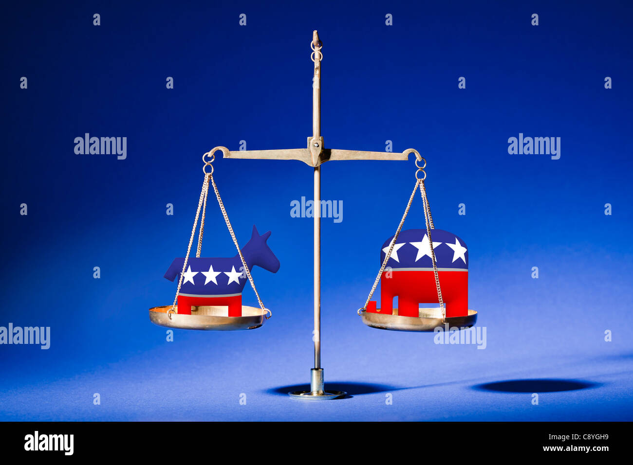 Studio shot of weight scale with political parties symbols Stock Photo