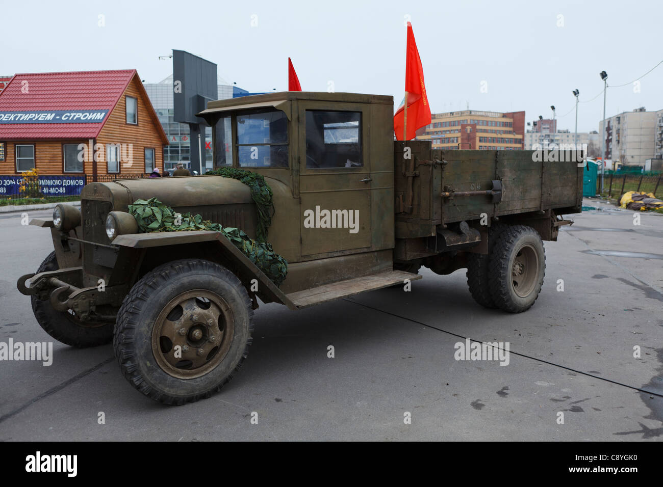Soviet lorry ZIS-5 with red flags on November 4, 2011 in Saint-Petersburg, Russia. Stock Photo