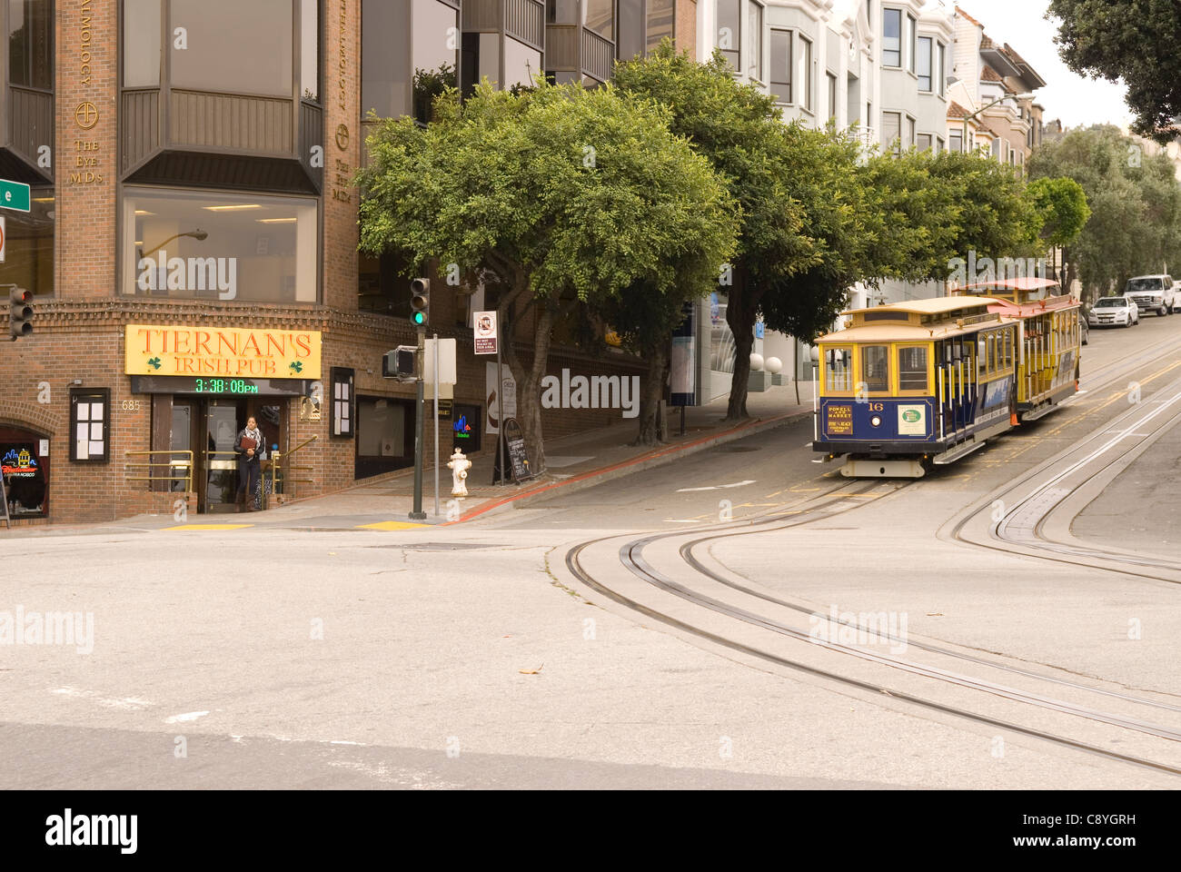 Stock photo shows cable car at bottom of hill, San Francisco, CA, USA. Stock Photo