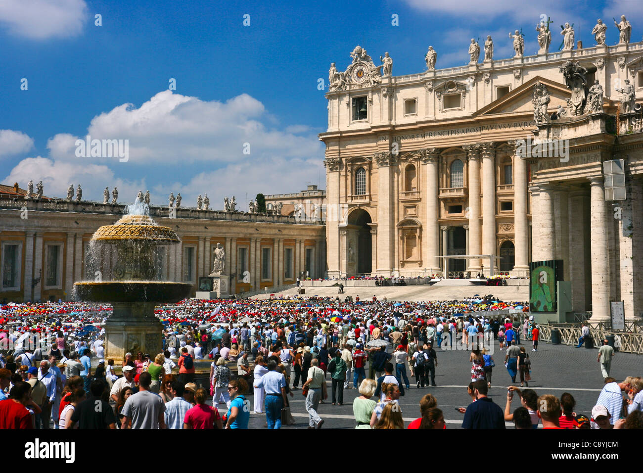 Crowds gather at St Peters Basilica for Mass with Pope Benedict XVI, Vatican City, Rome Italy Stock Photo