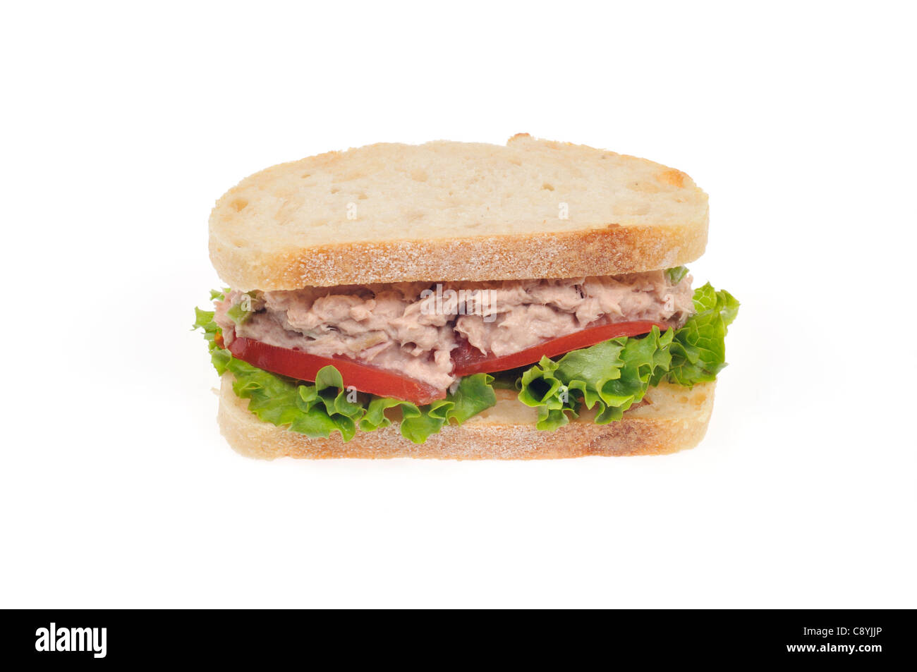 Tuna mayo sandwich  on white bread with lettuce and tomato on white background, cutout. Stock Photo