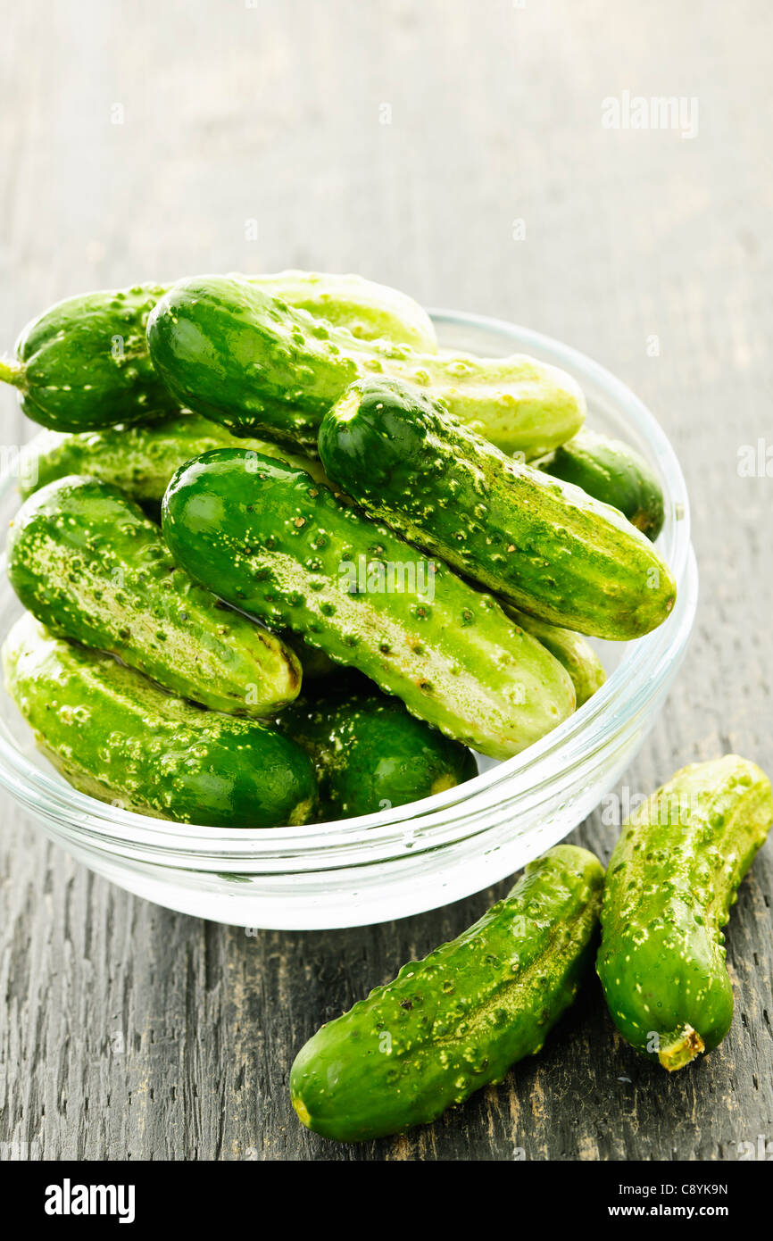Fresh green pickling cucumbers in a glass bowl Stock Photo Alamy