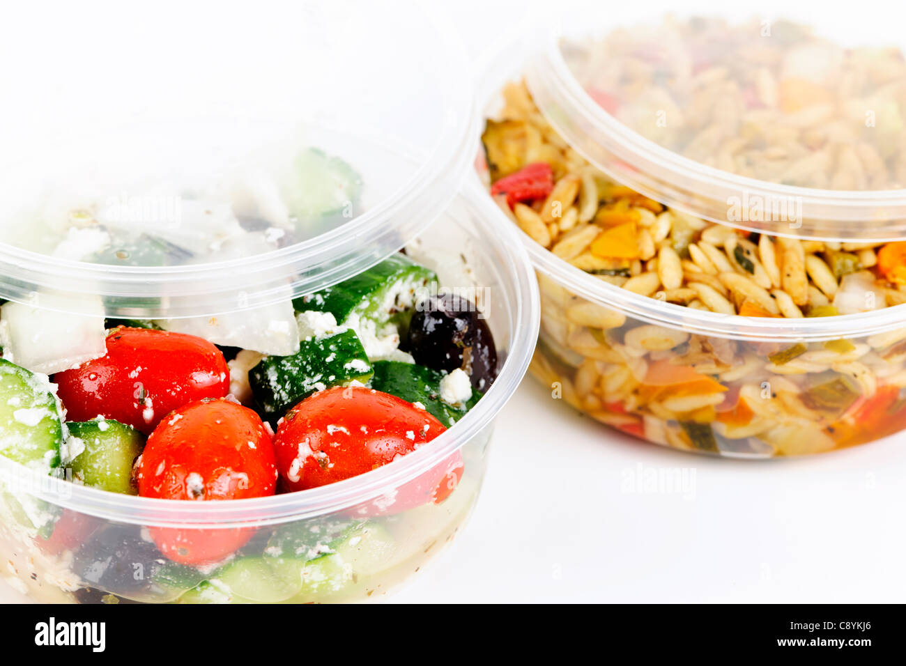 https://c8.alamy.com/comp/C8YKJ6/two-servings-of-prepared-salad-in-plastic-takeaway-containers-C8YKJ6.jpg