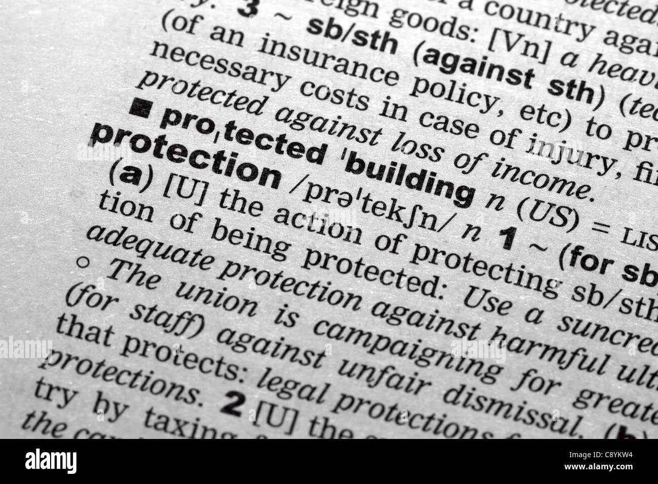 Focusing on word PROTECTION in english dictionary. Stock Photo