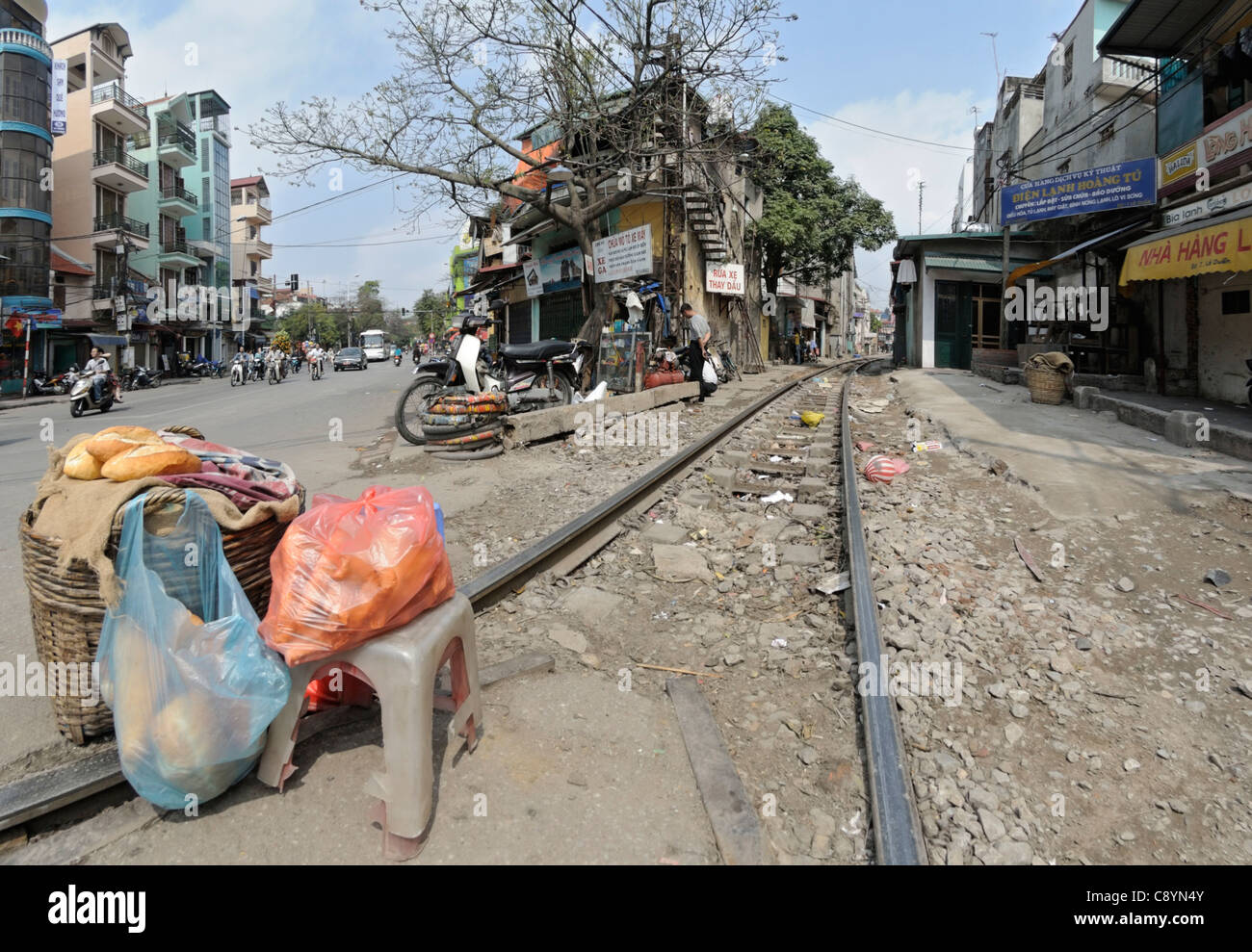 Asia, Vietnam, Hanoi. Railway track leading through Hanoi's centre.... Stock Photo