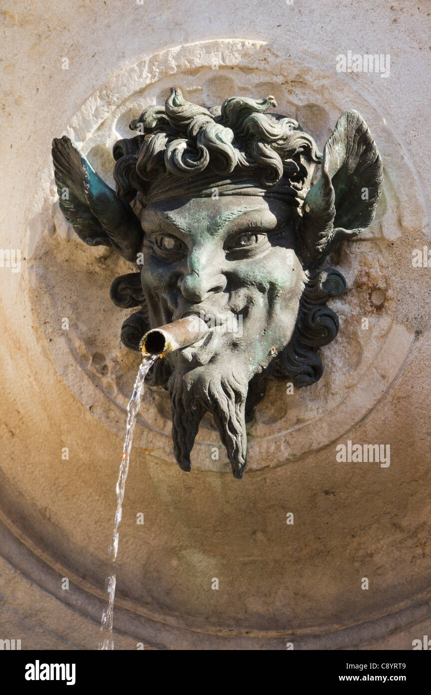 Ancona Italy - Fontana del Calamo, XIV century, attr Pellegrino Tibaldi. For horse watering. Bronze satyr head spout. Stock Photo
