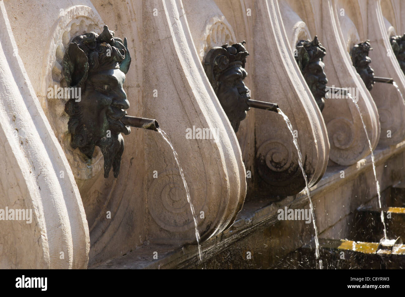 Ancona Italy - Fontana del Calamo, XIV century, attr Pellegrino Tibaldi. For horse watering. Bronze satyr head spouts. Stock Photo