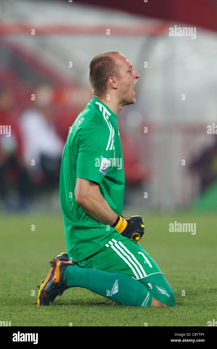 Goalkeeper Jan Mucha of Slovakia exults after Slovakia scored a goal against Italy in a 2010 FIFA World Cup Group F match. Stock Photo