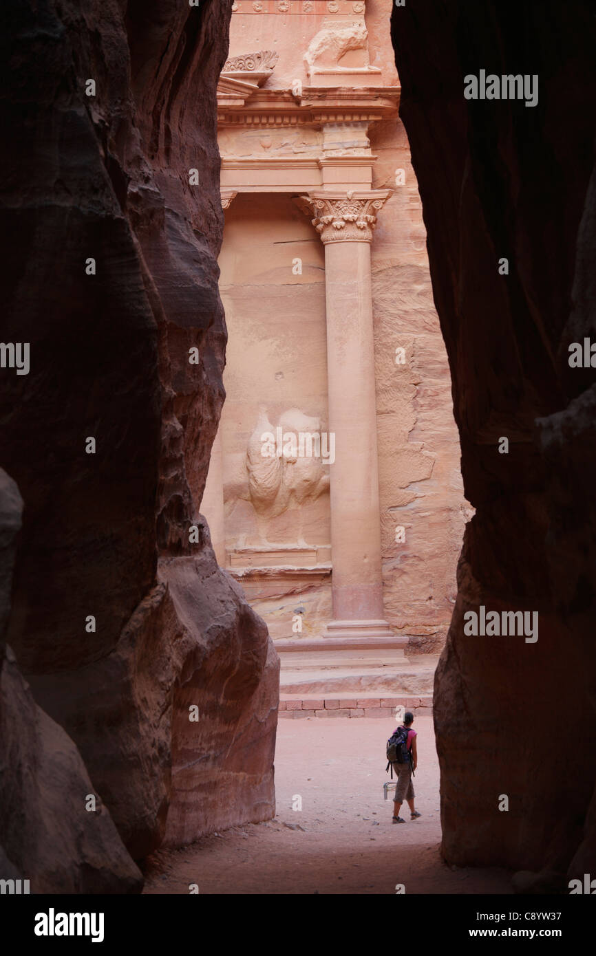 Al Khazneh (or Treasury) seen from the narrow Siq, Petra, Jordan Stock Photo