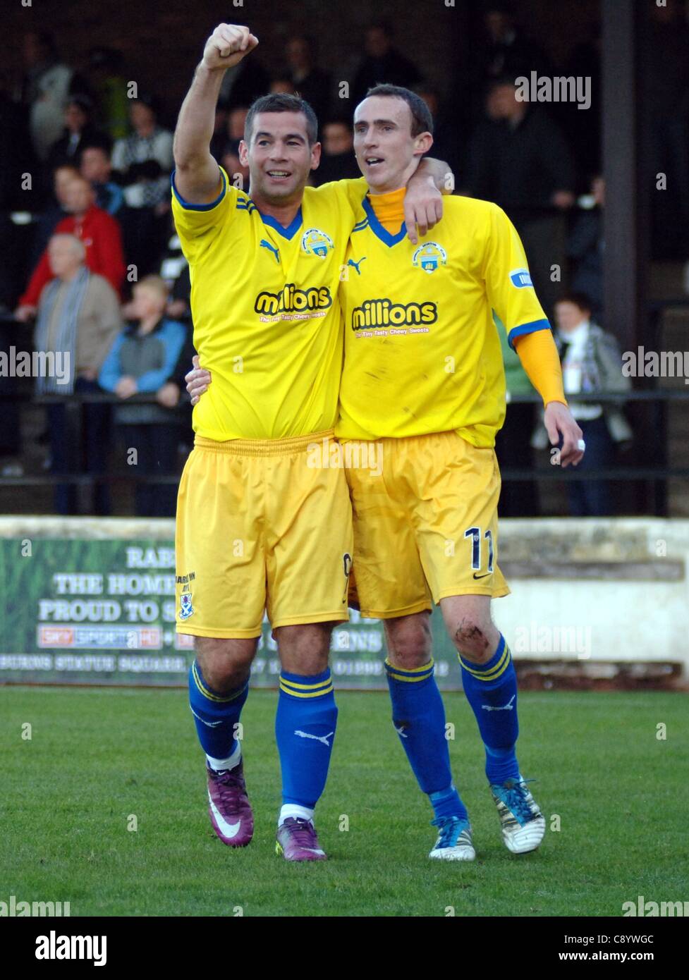 Celebration. Greenock Morton gaolscorer David O'Brien (No. 11) celebrates his goal with fellow striker Peter MacDonald in the match that finished 1-0.        Ayr United v Greenock Morton.  Scottish League Division One.  Somerset Park, Ayr.  5th November, 2011.          All pictures must be cred Stock Photo