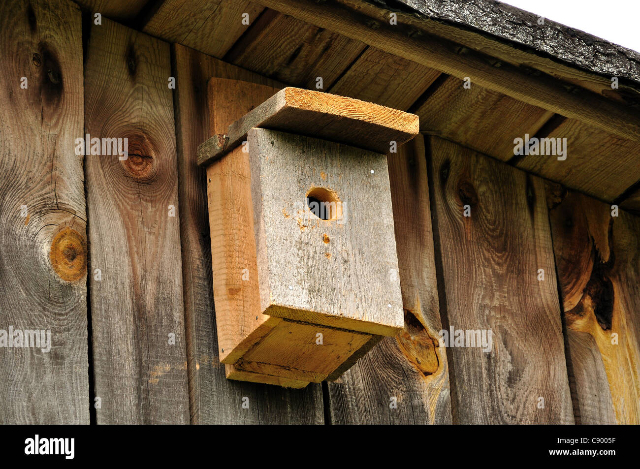 Wooden birdhouse. Stock Photo