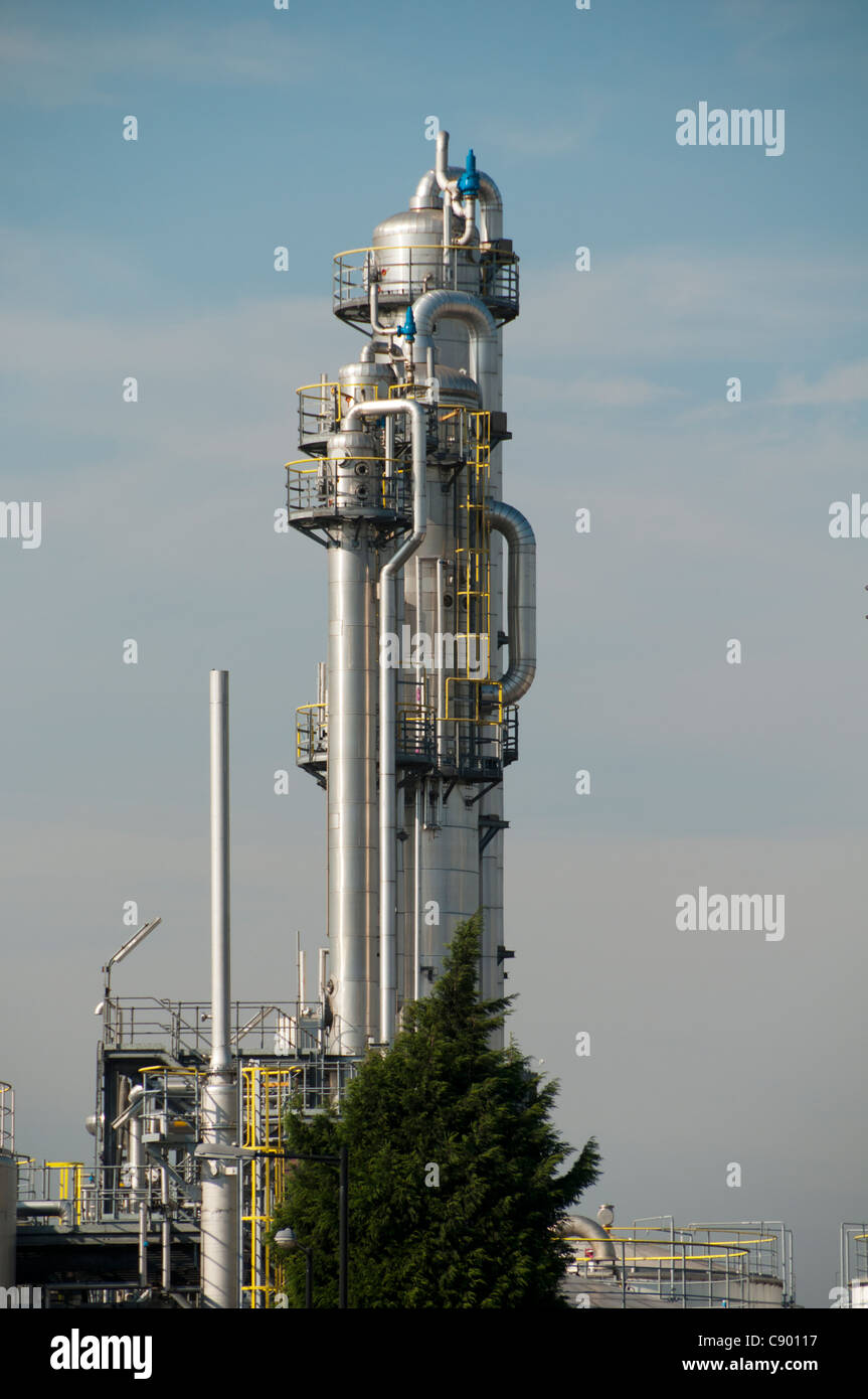 Industrial fractionating column at a foodstuffs factory in Trafford Park, Manchester, England, UK Stock Photo