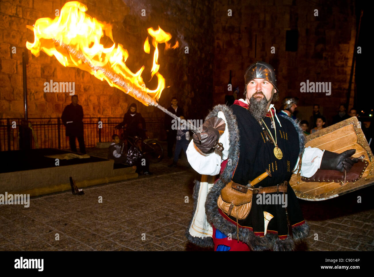 An Italian actor dresses as knight fight with sword and fire in the annual medieval style knight festival Stock Photo