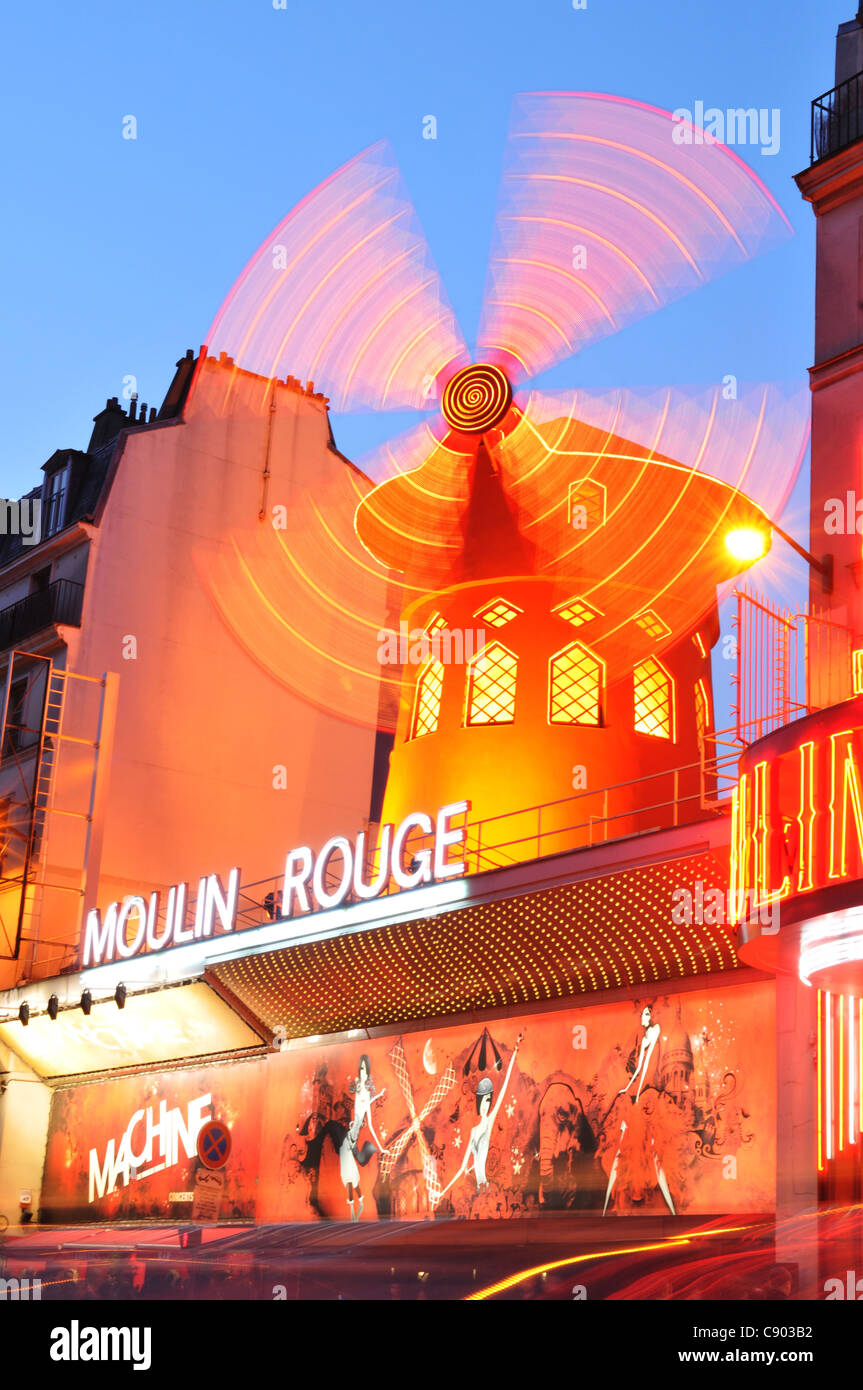 Moulin Rouge in Paris at night Stock Photo