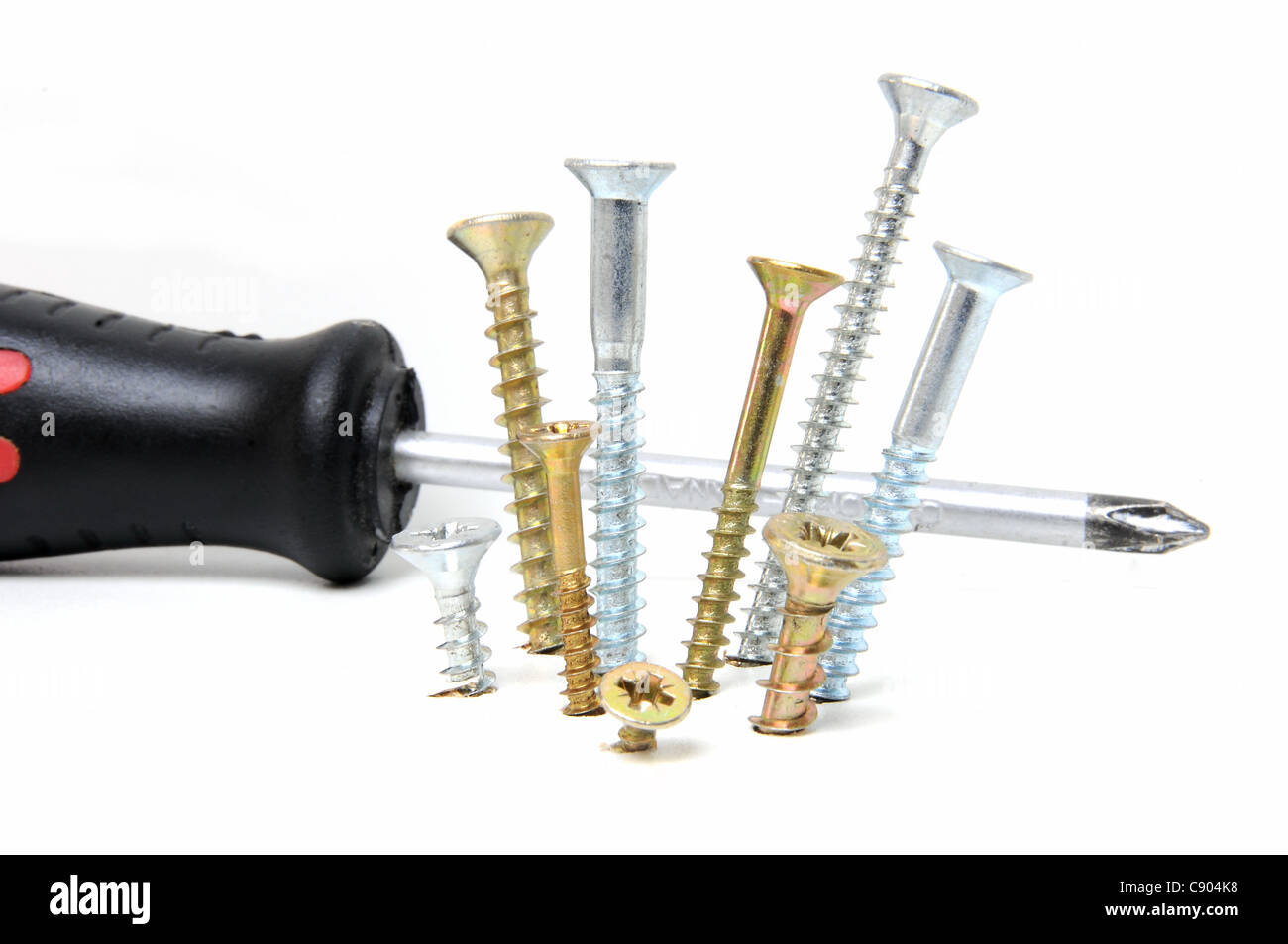 Group of drywall screws on white background Stock Photo